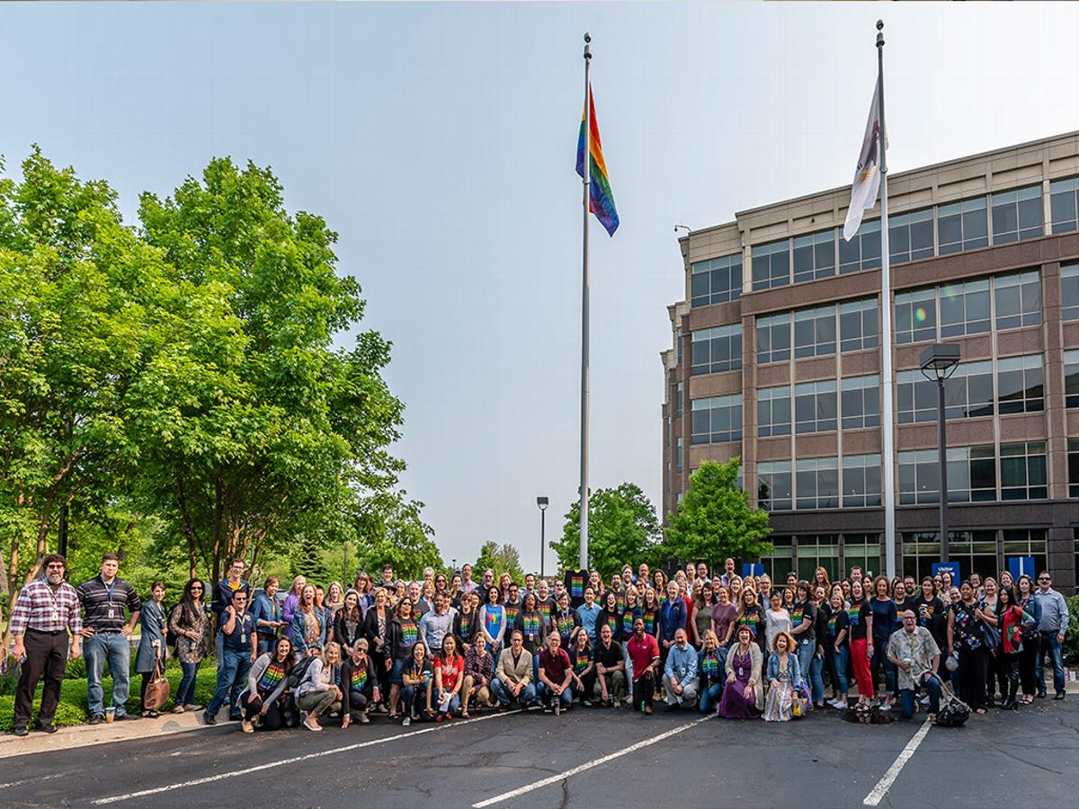 AbbVie colleagues gather in 2019 for the raising of the pride flag during LGBT Pride Month.